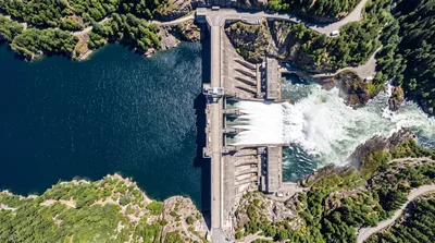 Aerial View Of A Hydroelectric Dam Releasing Water