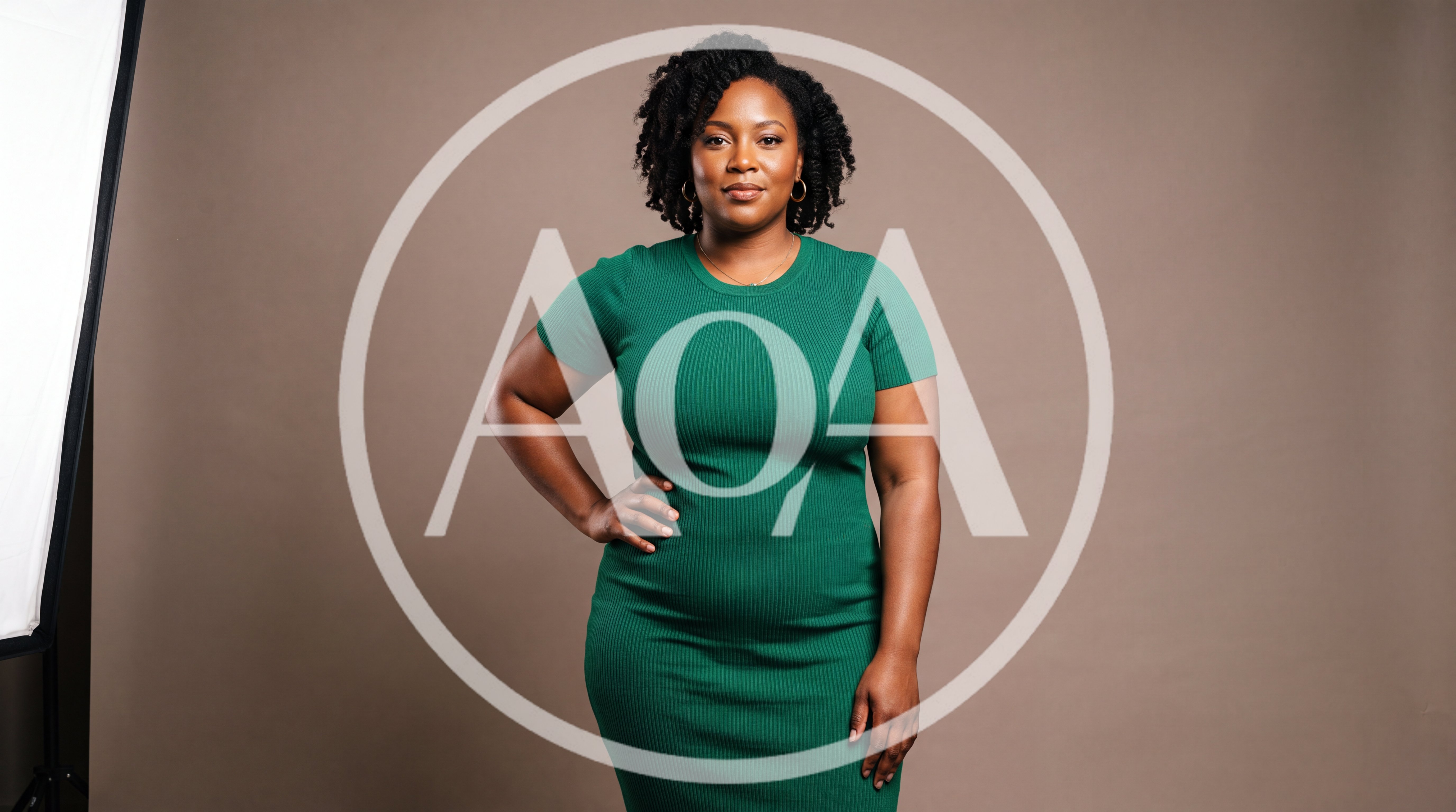 Professional Portrait Of A Confident Woman In Green Dress