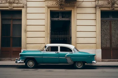 Vintage Teal And White Classic Car Parked On Street