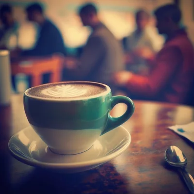 Cappuccino Cup With Latte Art In A Cafe