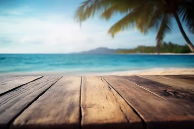 Empty Wooden Table Overlooking A Tropical Beach
