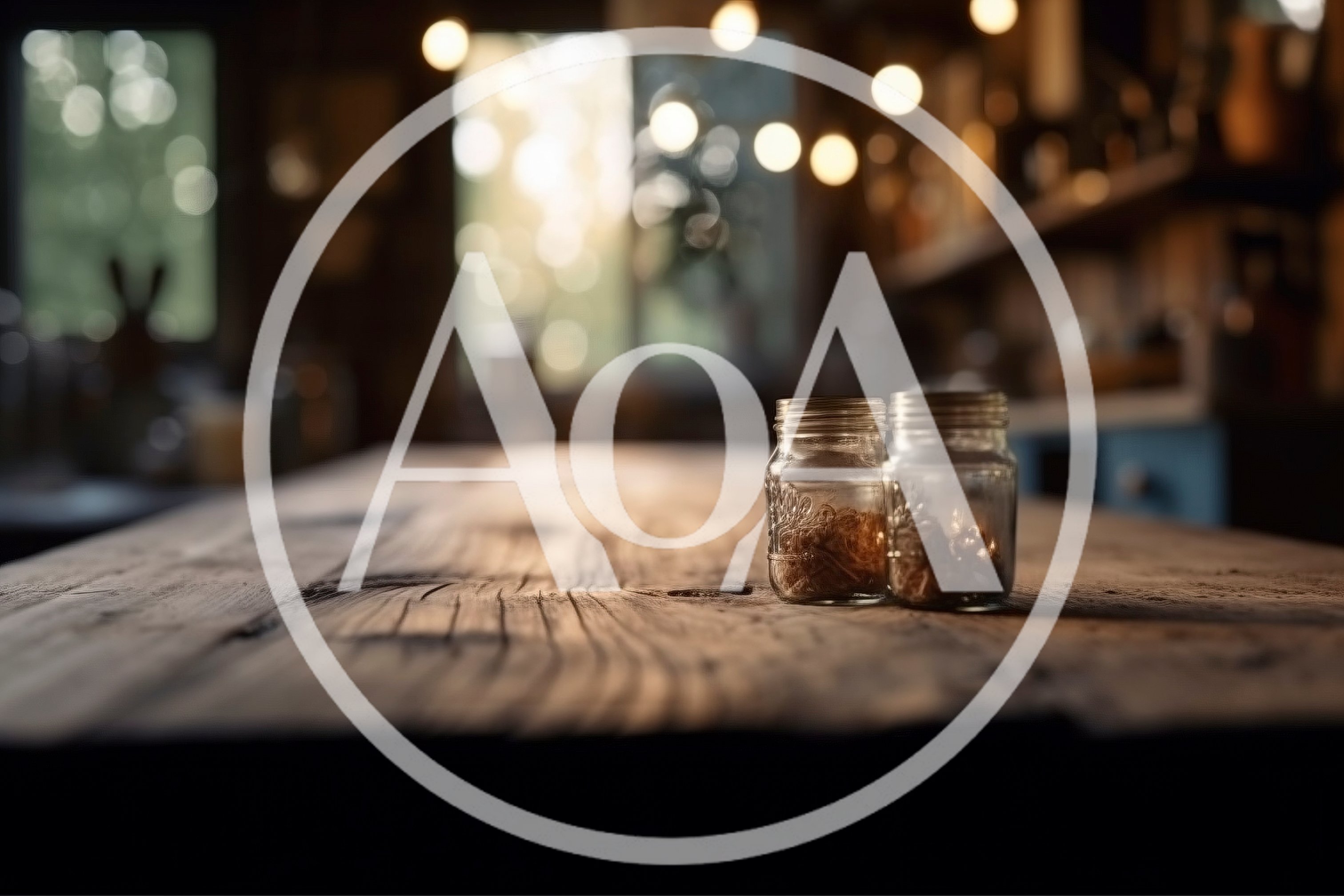 Two Small Glass Jars On A Rustic Wooden Table
