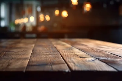 Rustic Wooden Table Surface With Blurred Restaurant Background
