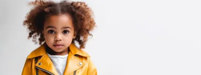 Portrait Of A Young Girl In A Yellow Jacket