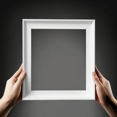 Hands Holding A Blank White Picture Frame