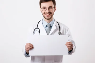 Male Doctor Holding Blank White Sign