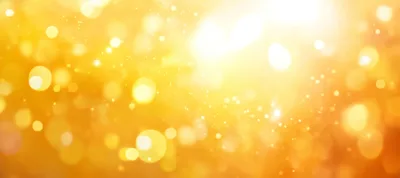 Golden Bokeh Light Particles Background