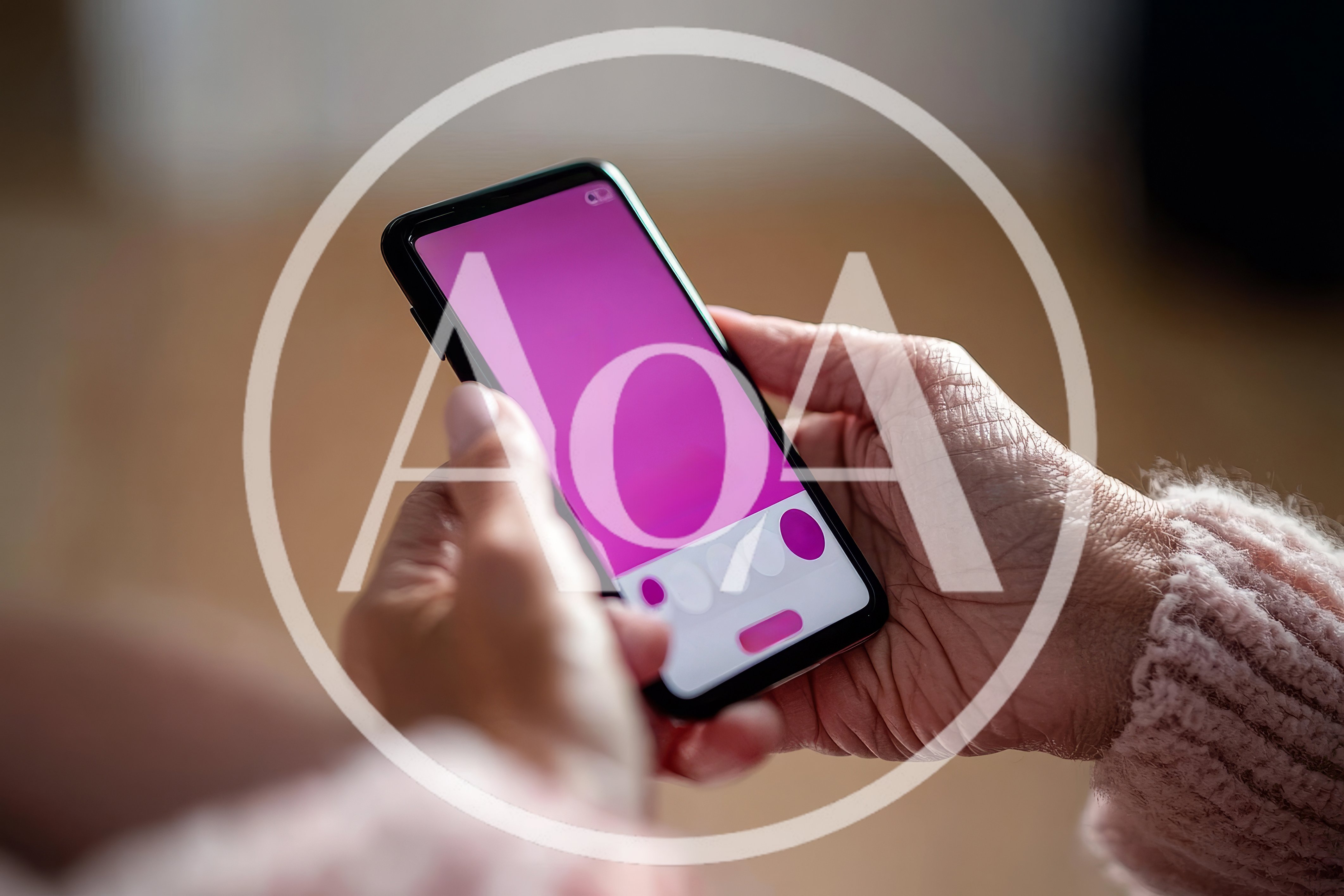 Senior Woman Using Smartphone With Pink Screen