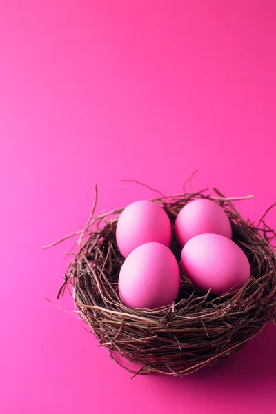 Four Pink Easter Eggs In A Twig Nest