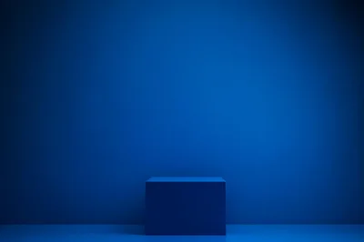 Blue Rectangular Pedestal Against A Solid Blue Wall