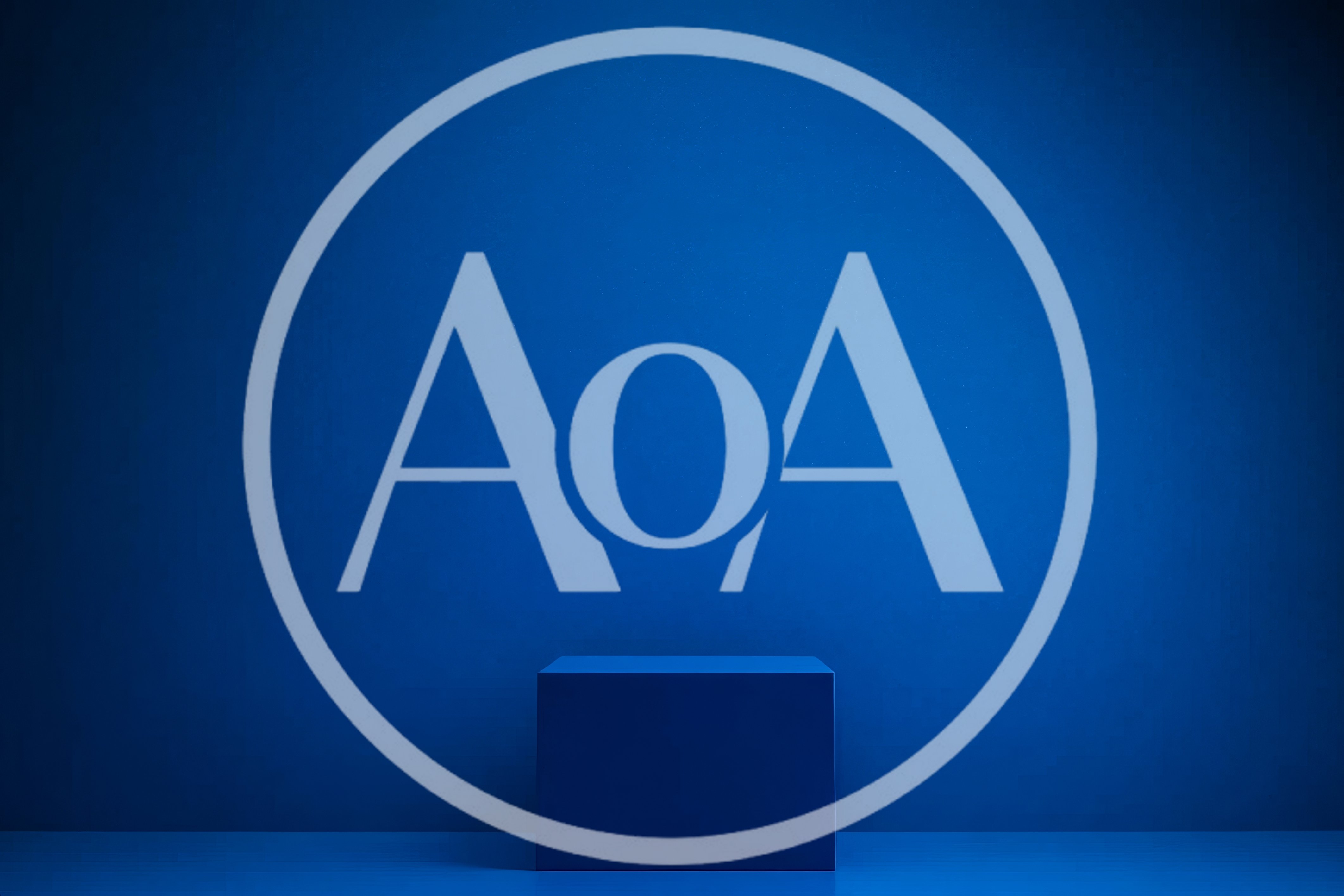 Blue Rectangular Pedestal Against A Solid Blue Wall