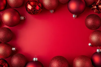 Red Christmas Ornaments Arranged In A Frame