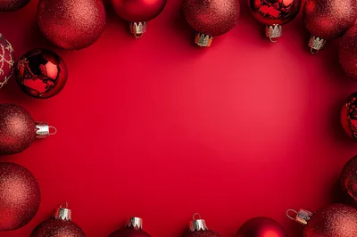 Red Christmas Ornaments Arranged In A Frame