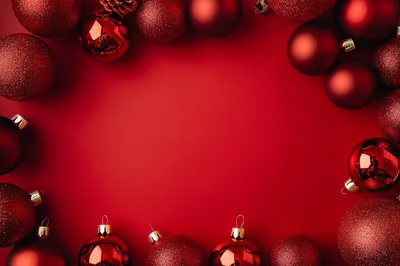 Red Christmas Ornaments Arranged In A Frame