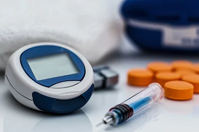 Diabetes Management Tools With Glucose Meter And Syringe