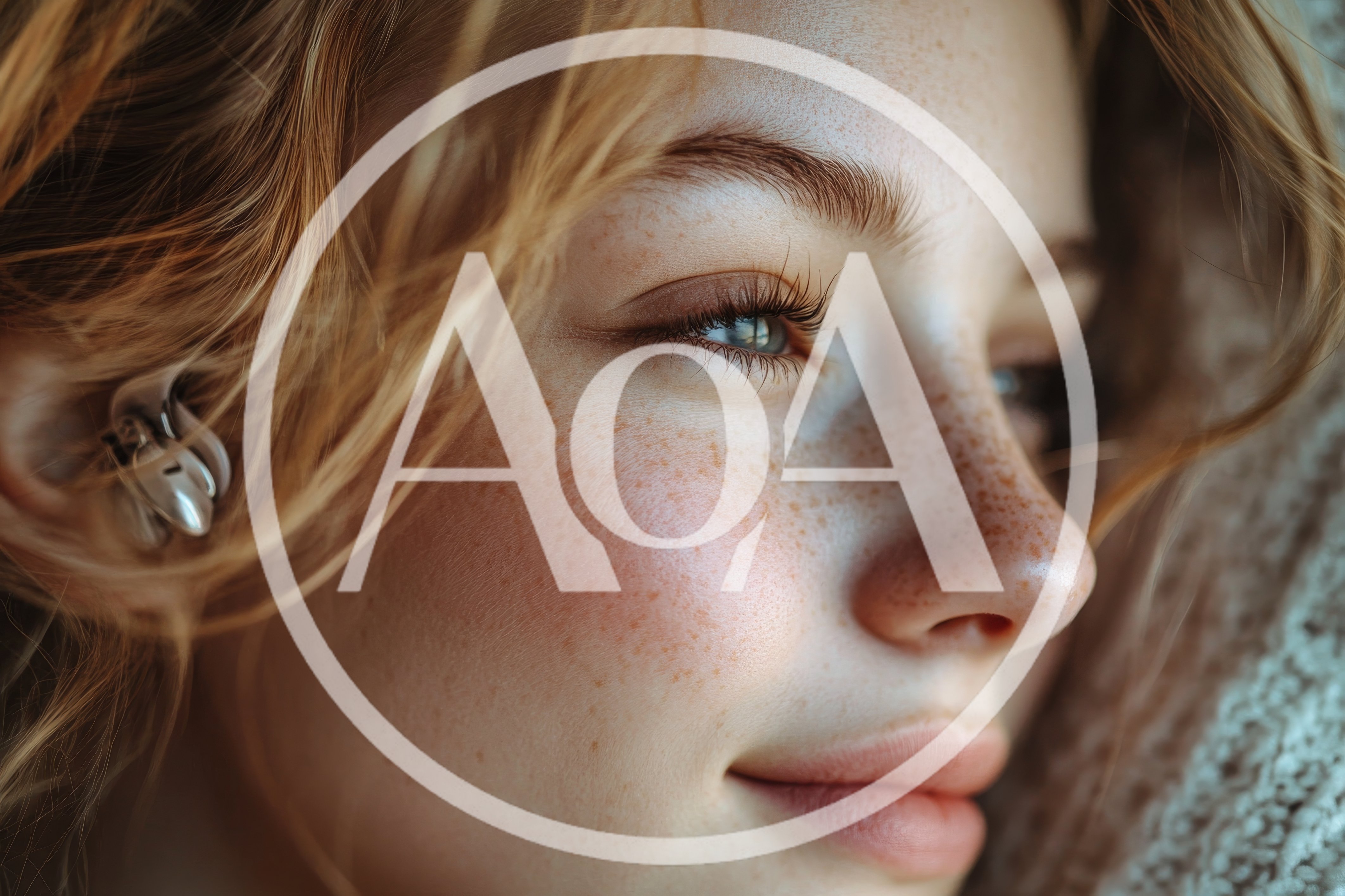 Close Up Portrait Of A Young Woman With Freckles