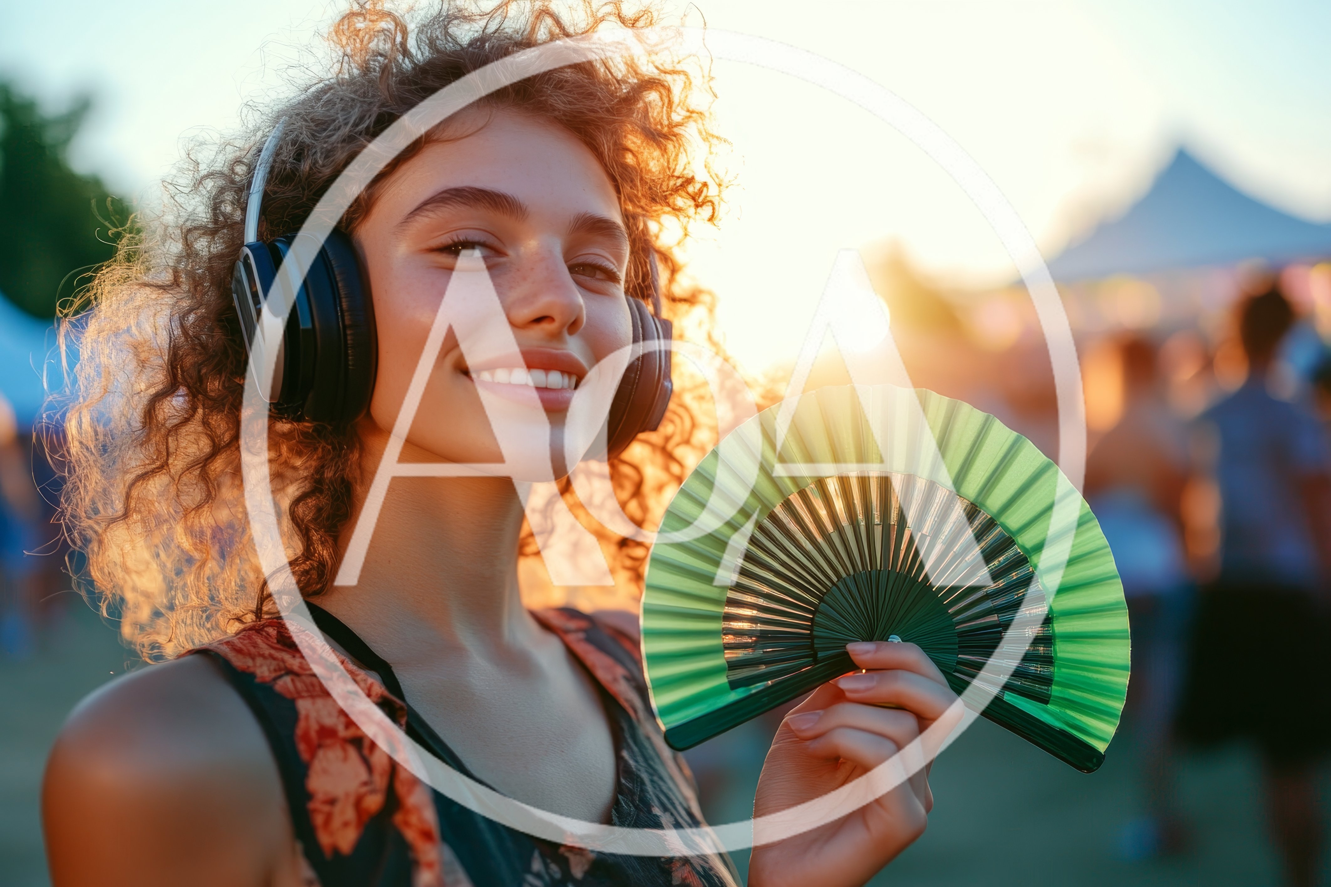 Young Woman With Curly Hair Holding Green Hand Fan