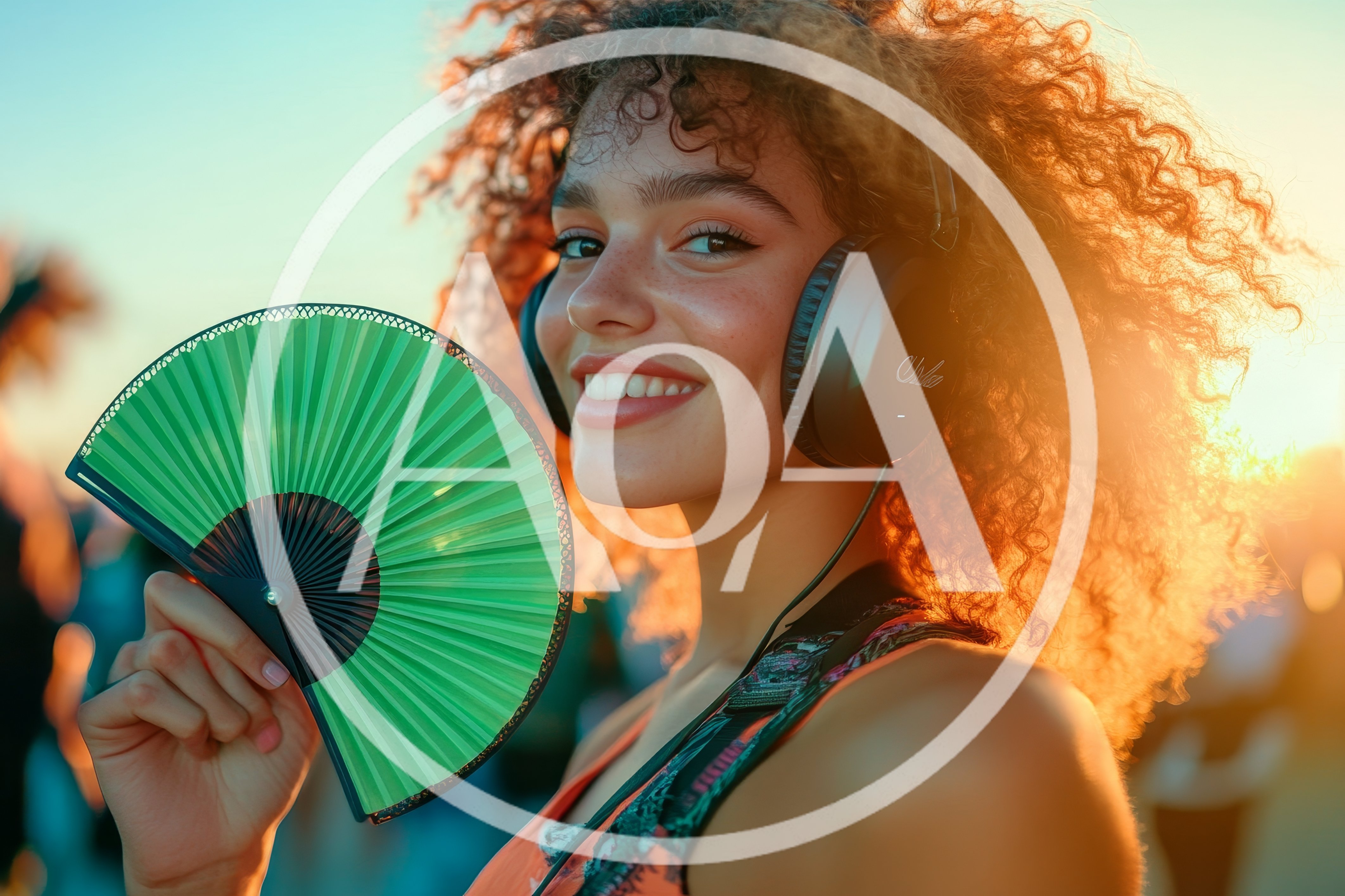 Young Woman With Curly Hair Holding Green Hand Fan