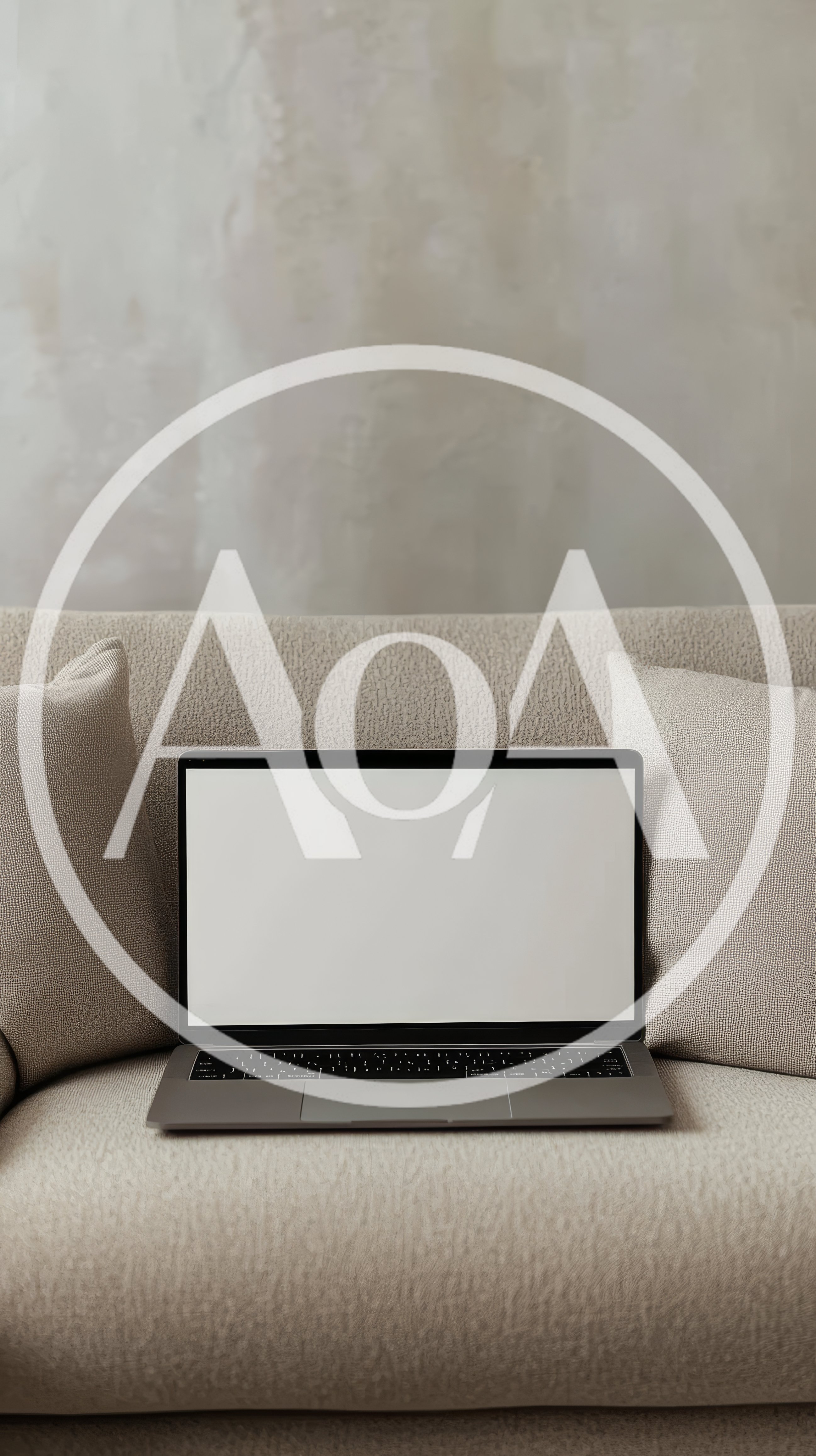 Laptop With Blank Screen On A Cozy Sofa