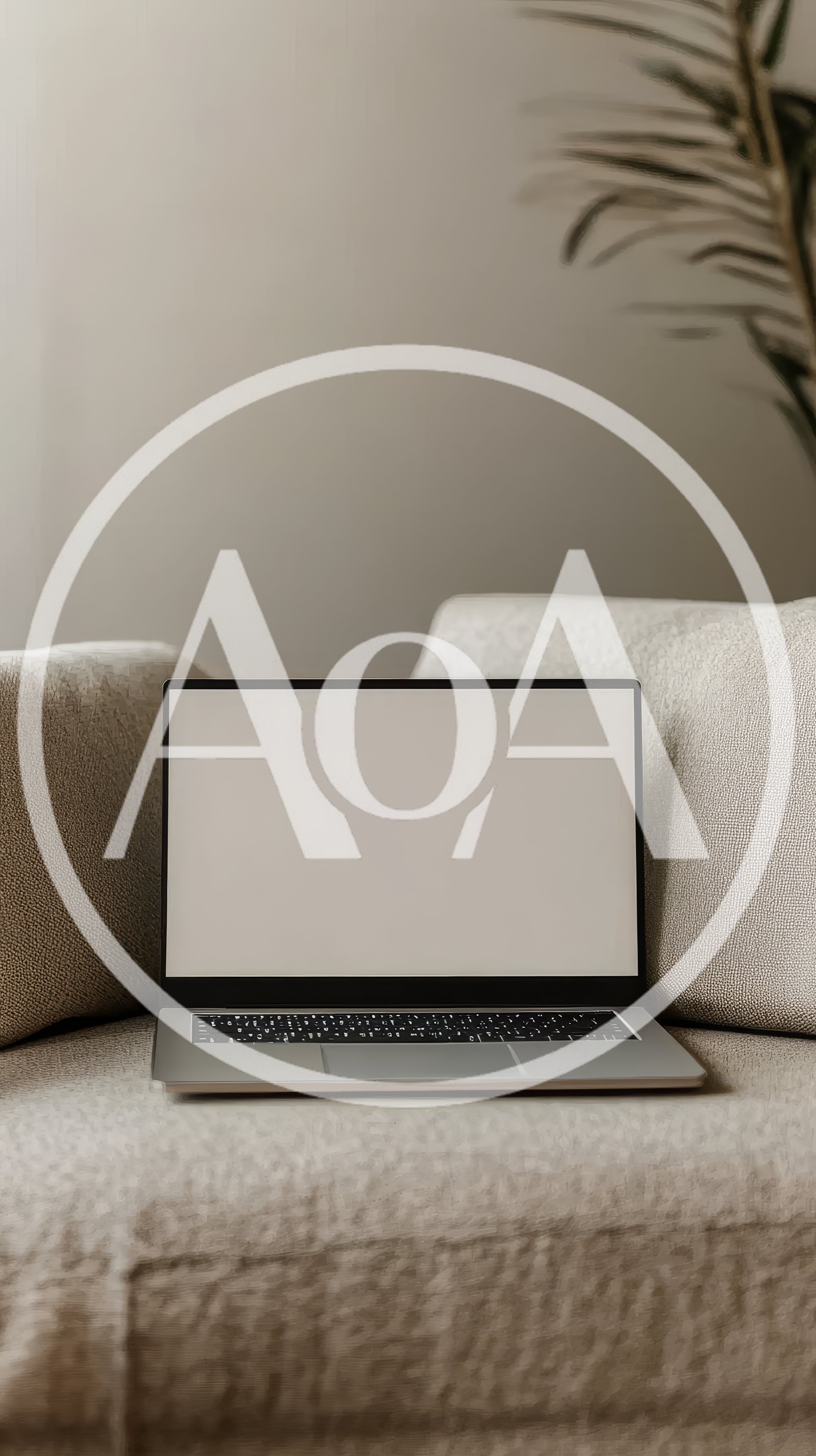 Laptop With Blank Screen On A Cozy Sofa