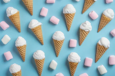 Ice Cream Cones and Marshmallows Pattern on Blue Background