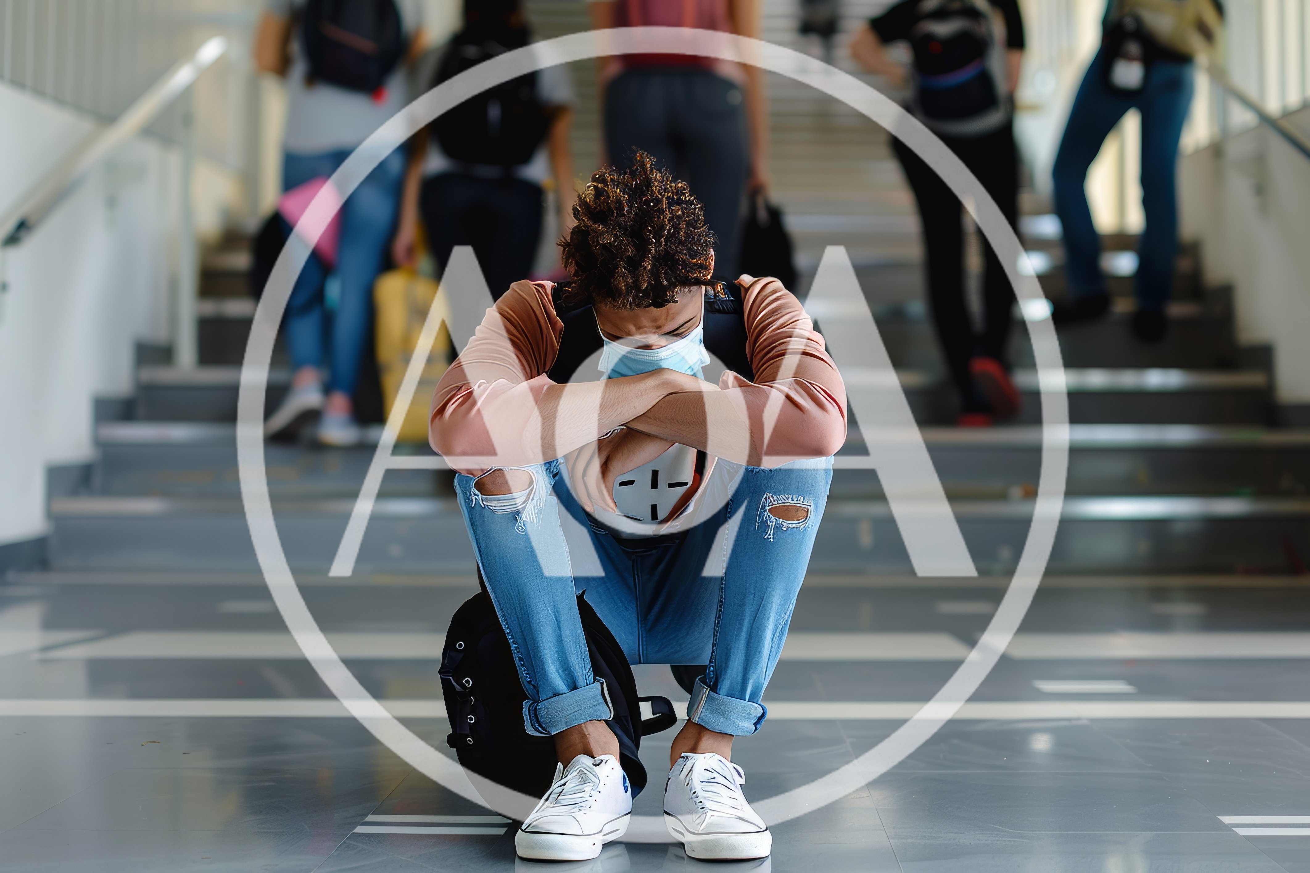 Sad Student Sitting Alone On School Hallway Floor