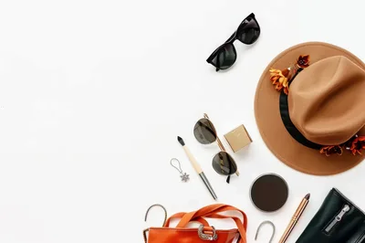 Flat Lay Of Fashion Accessories On White Background