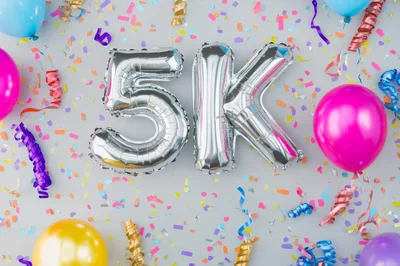 Silver 5K Balloon Celebration With Colorful Confetti