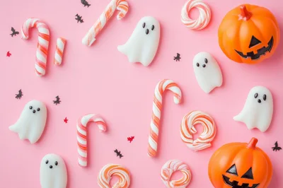 Halloween Candy Flat Lay with Ghosts and Pumpkins