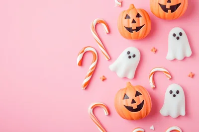 Halloween Candy Decorations on Pink Background