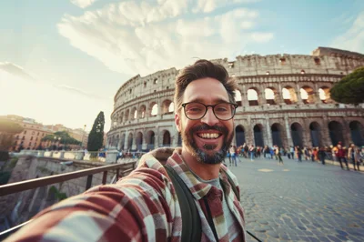 Man Taking Selfie In Front Of The Roman Colosseum