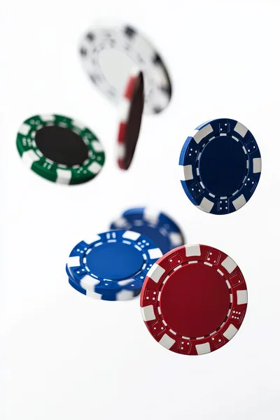 Floating Casino Poker Chips on White Background