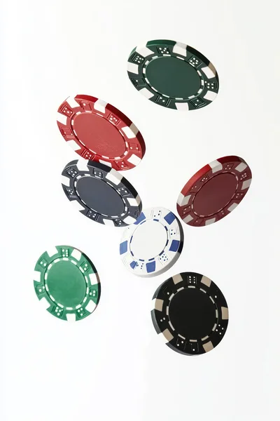 Floating Casino Poker Chips On White Background