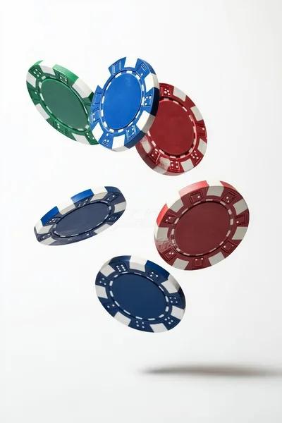 Five Colorful Casino Poker Chips Floating in Midair