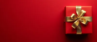 Red Gift Box With Gold Ribbon On Red Background