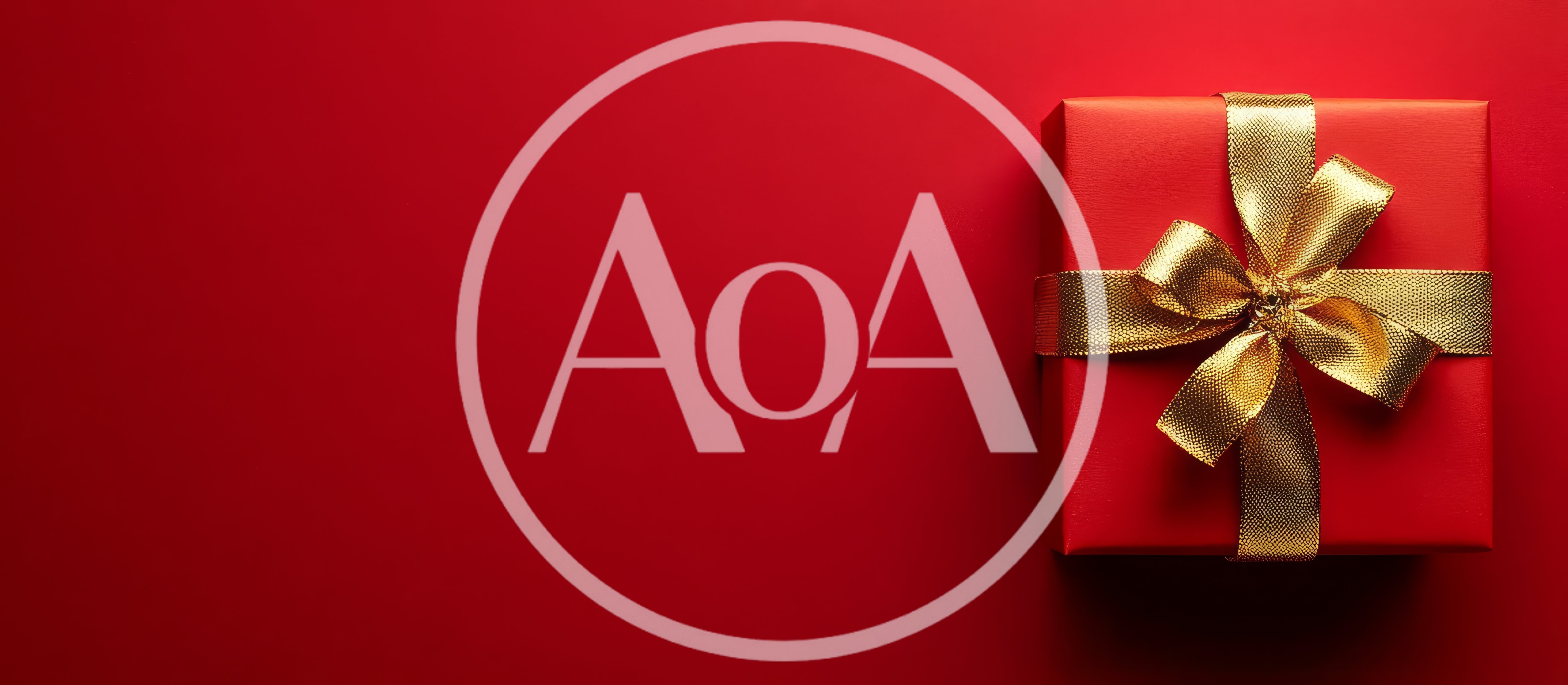 Red Gift Box With Gold Ribbon On Red Background