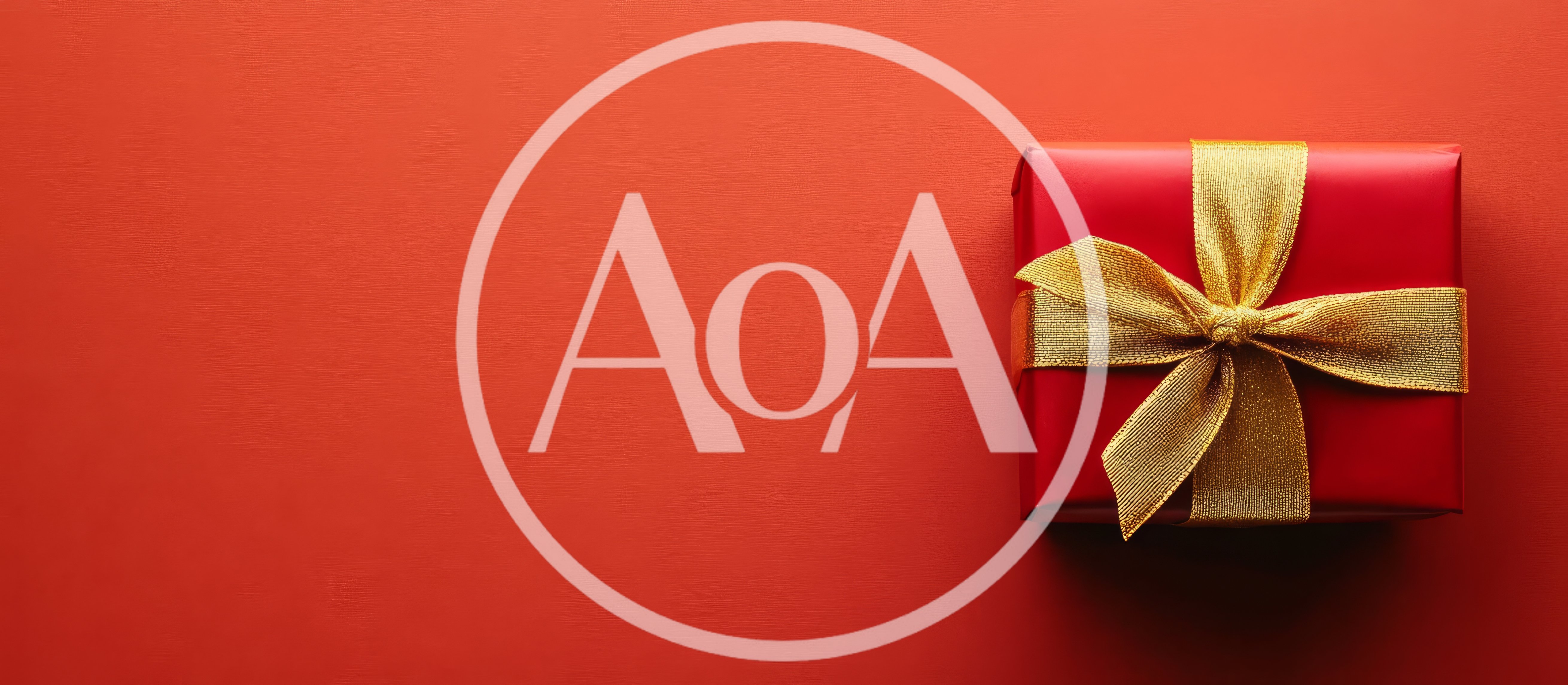 Red Gift Box With Gold Ribbon On Red Background