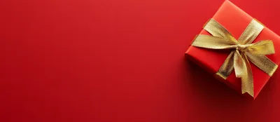 Red Gift Box With Gold Ribbon On Red Background