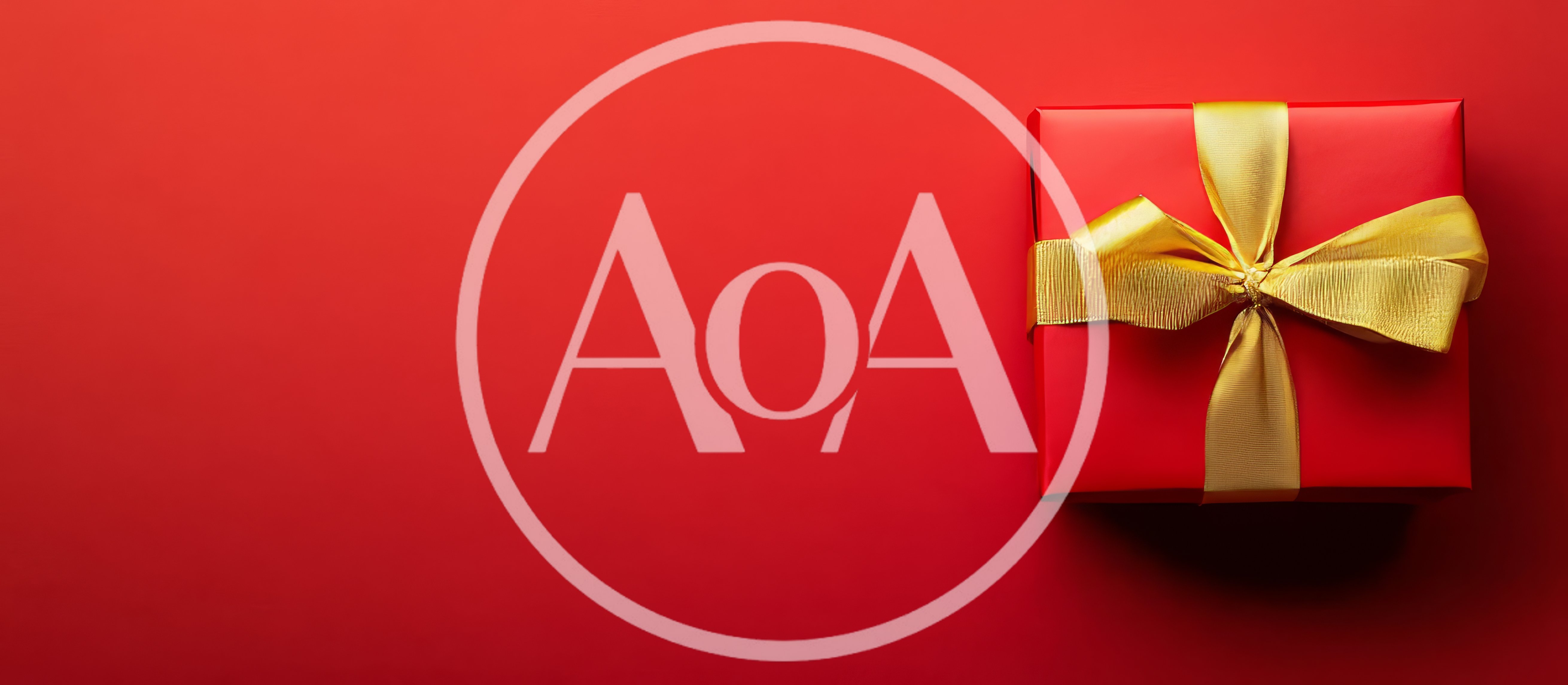 Red Gift Box With Gold Ribbon On Red Background