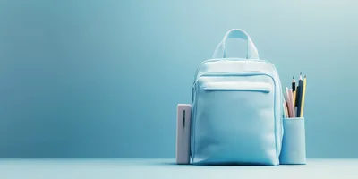 Light Blue Backpack With Stationery On Solid Background