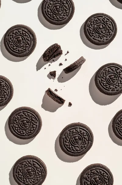 Top View Of Chocolate Sandwich Cookies On White Background
