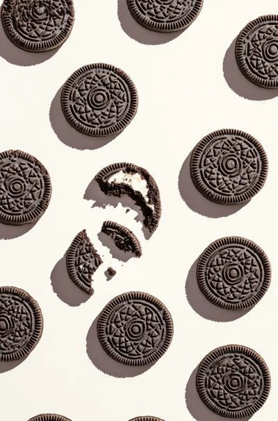 Top View Of Chocolate Sandwich Cookies On White Background