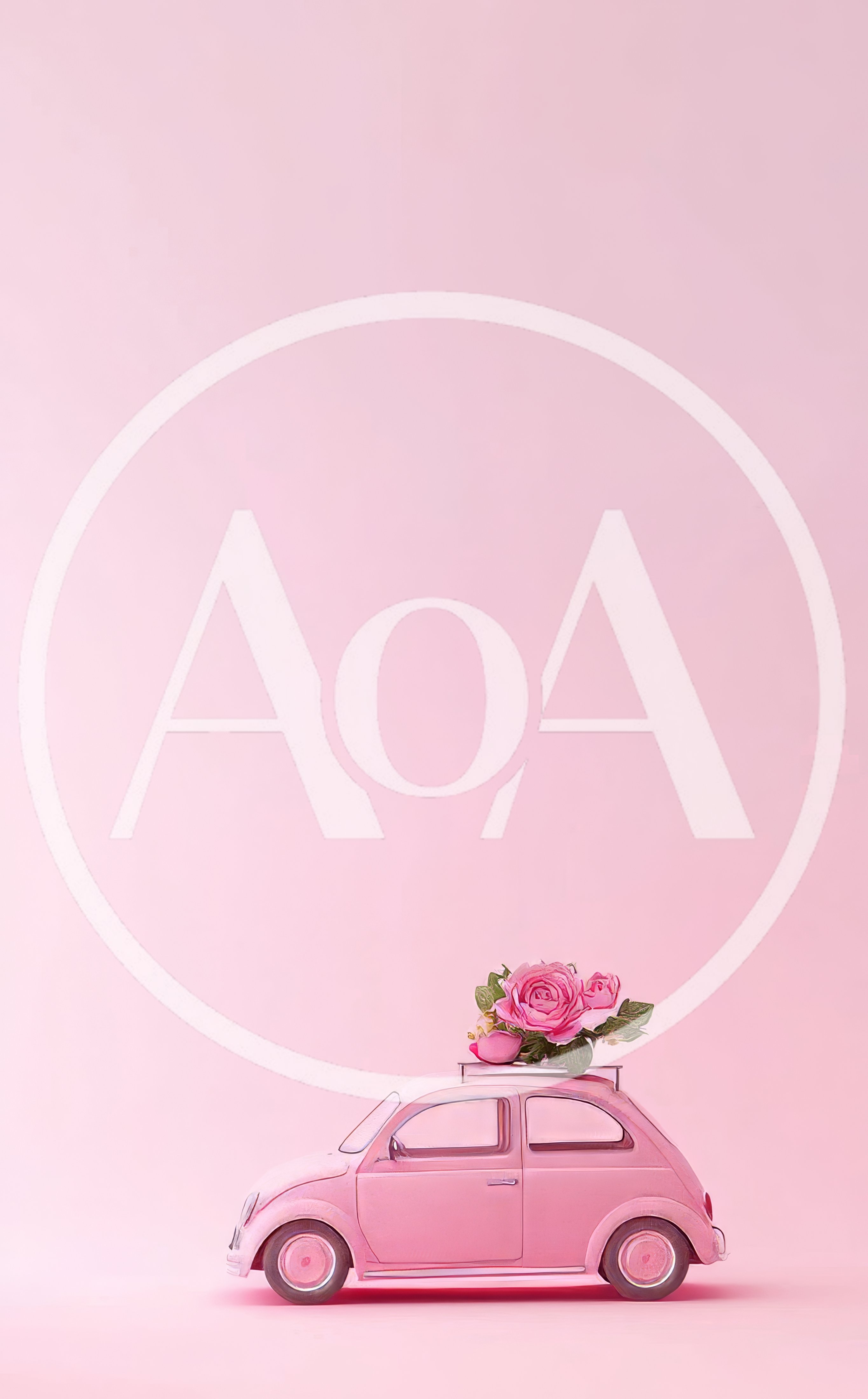 Pink Toy Car Carrying Flowers On Roof