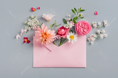 Pink Envelope Filled With Fresh Spring Flowers