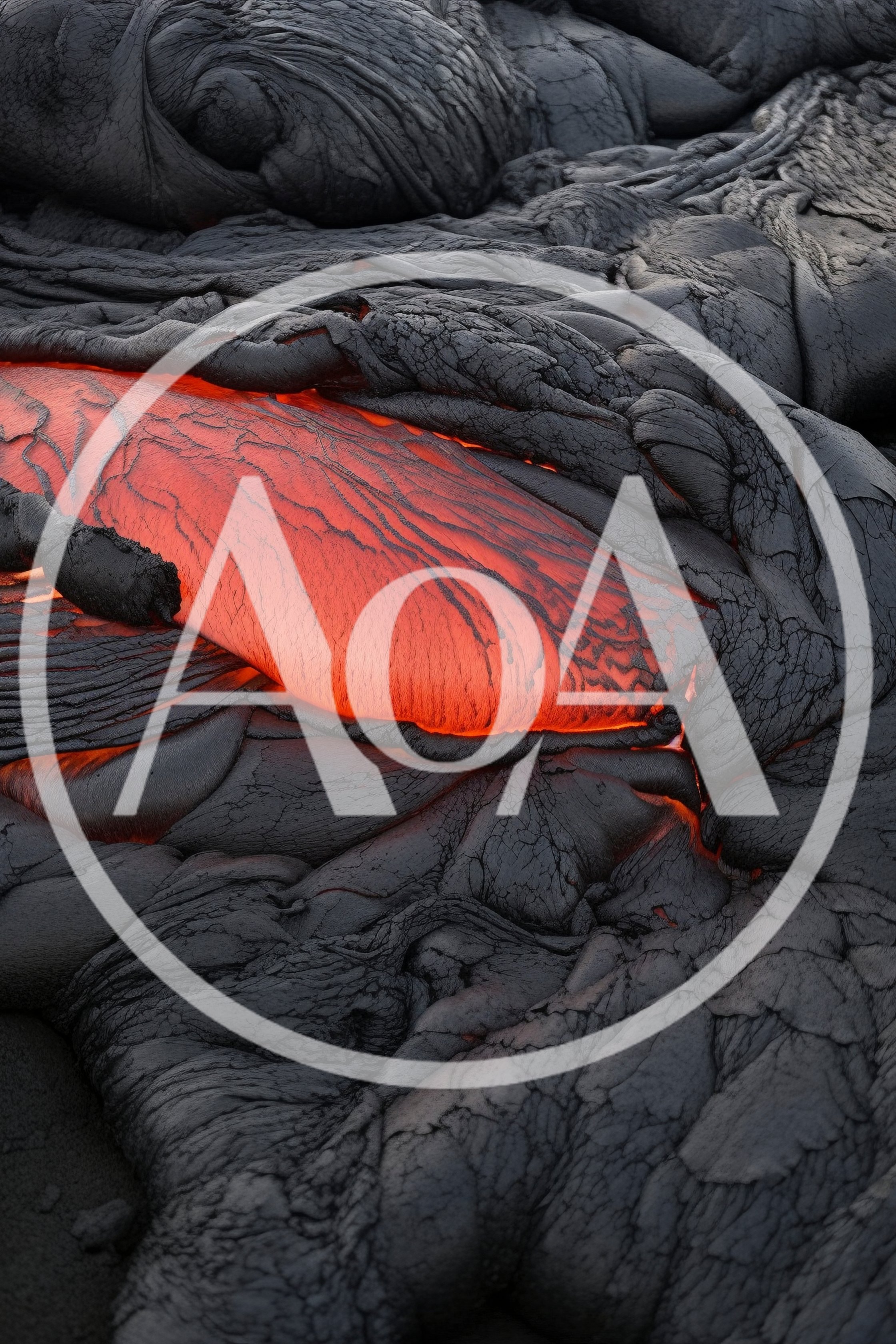 Molten Lava Flowing Over Hardened Volcanic Rock