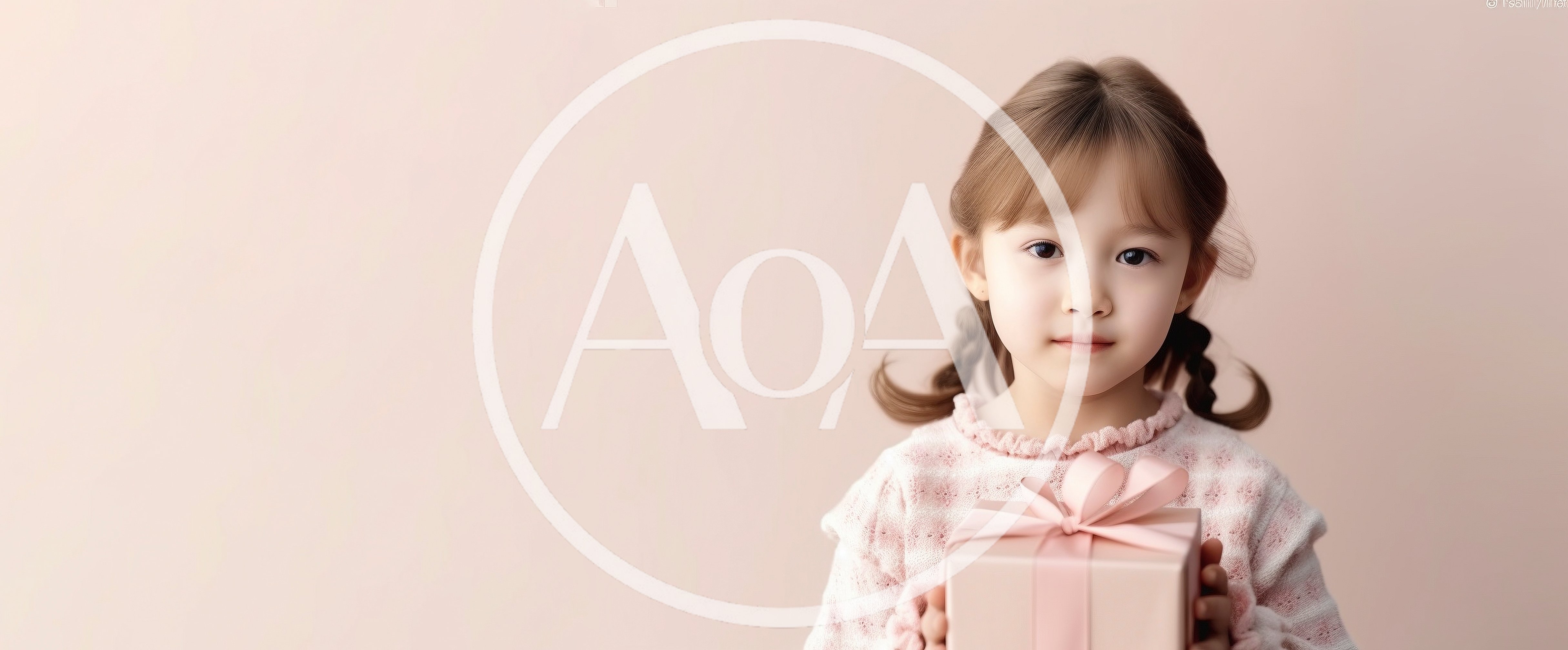 Young Girl Holding A Pink Gift Box