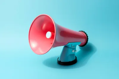 Pink Megaphone On A Light Blue Background