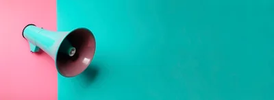 Turquoise Megaphone on Pink and Teal Background