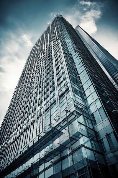 Low Angle View Of Modern Glass Skyscraper