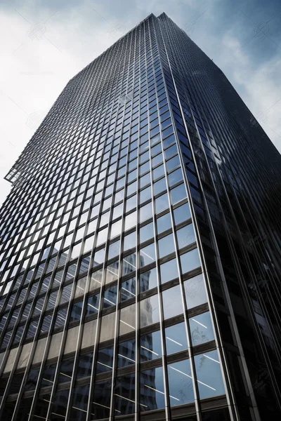Low Angle View Of Modern Glass Skyscraper